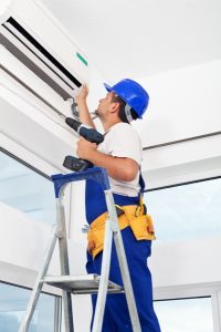 Ductless Technician on Ladder